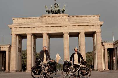 We are biking borders from Berlin to Beijing to build schools.